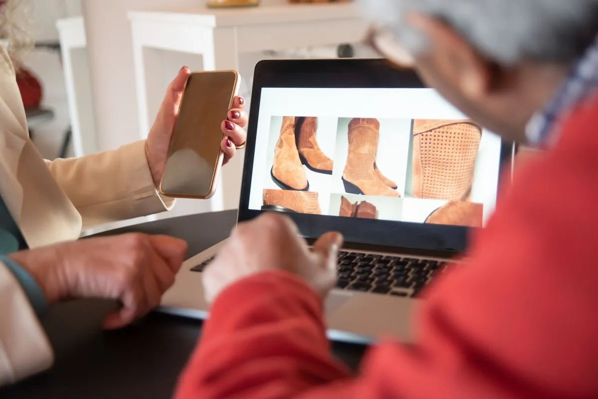 online shopper browsing a product catalog on a laptop